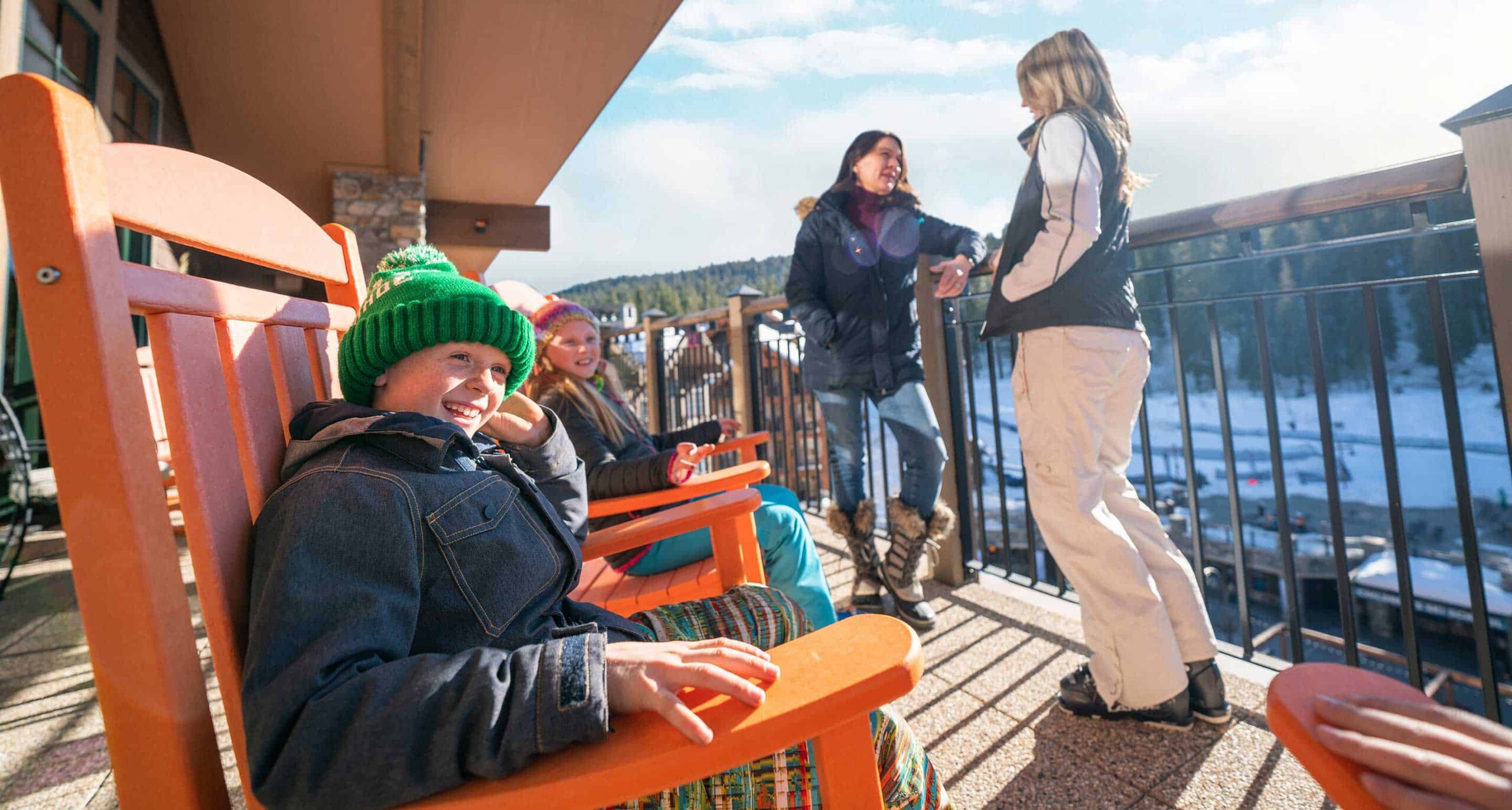 Family on a deck in Northstar Village